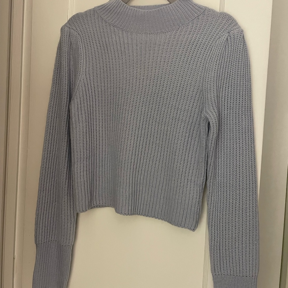 Vestique high-neck sweater.